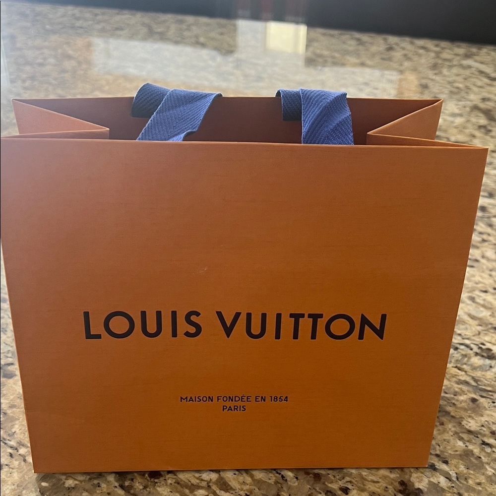 Louis Vuitton Bold Orange Bag with Blue Straps